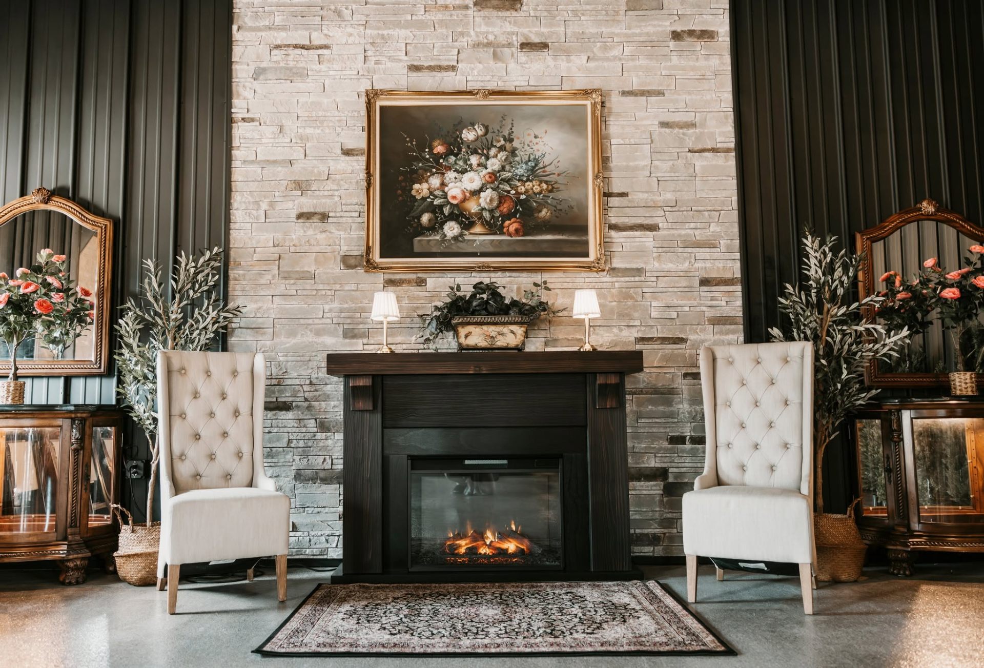 Stone fireplace with tufted wing chairs